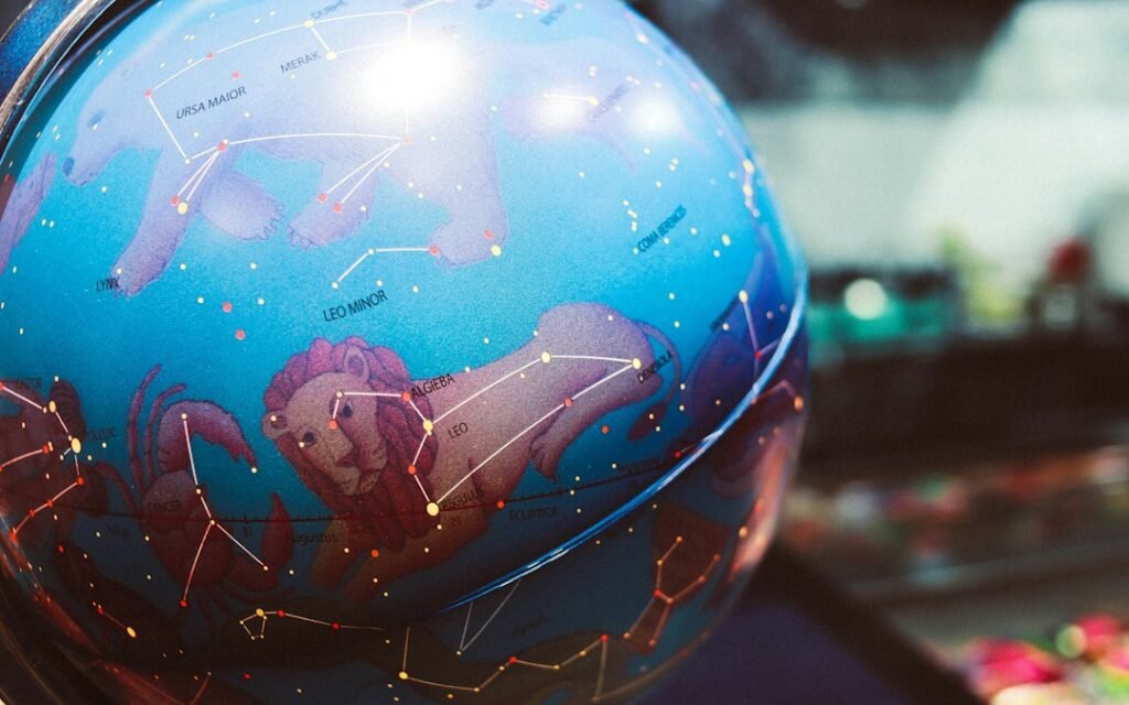 Astrology zodiac globe representing the October 2026 horoscope for all 12 zodiac signs