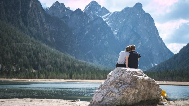 Couple overlooking mountains illustrating Virgo and Capricorn relationship compatibility